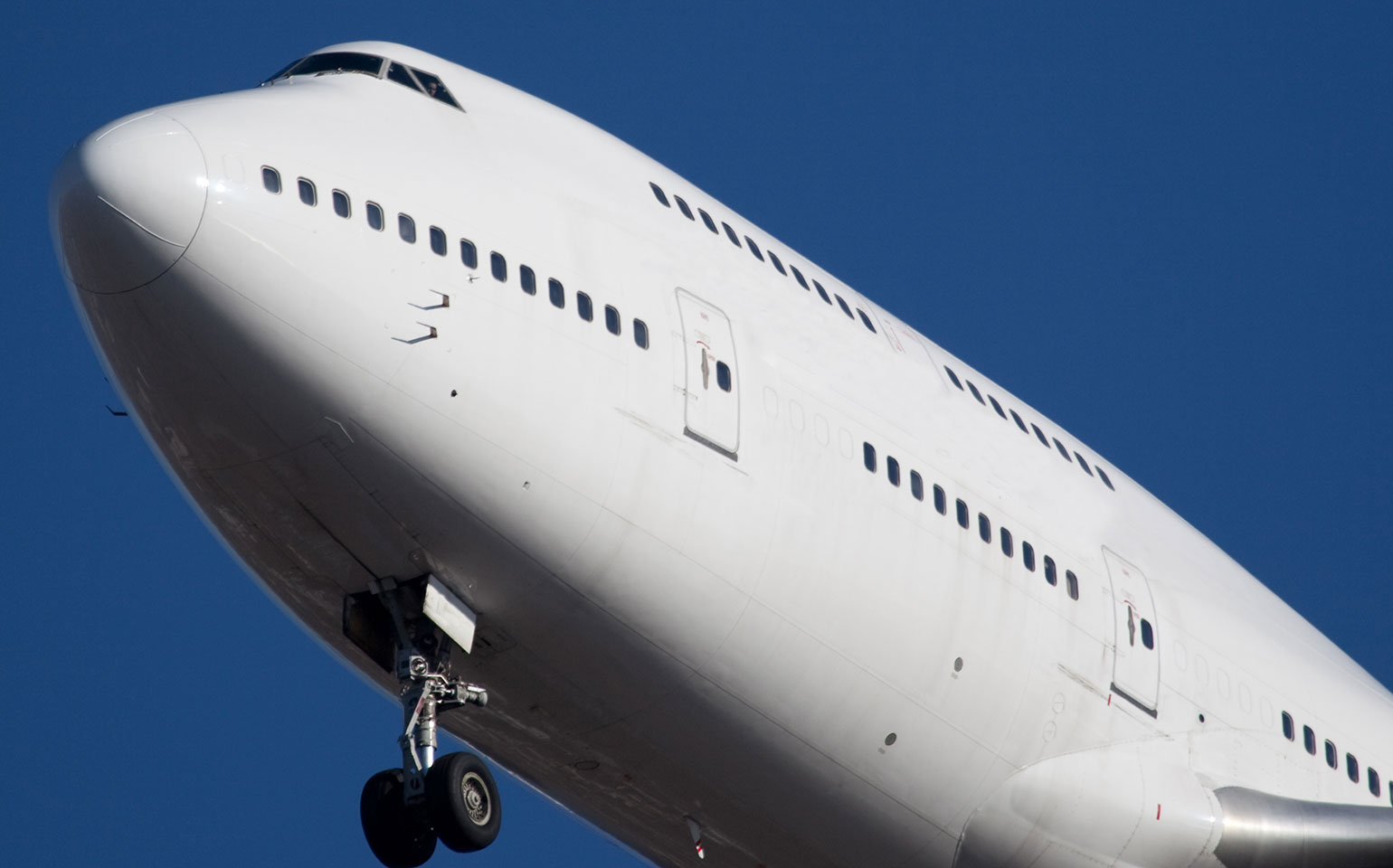 Boeing B747-400 private aircraft nose of large chartered commercial plane